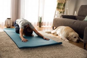 Dog and Owner doing yoga